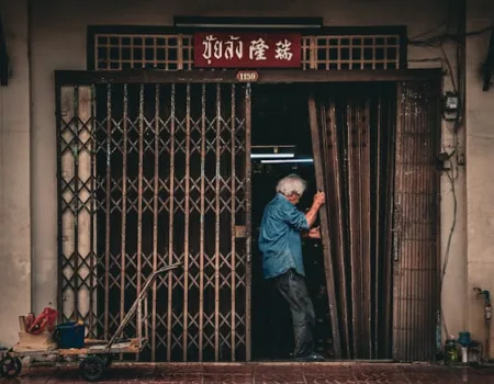 Photo by Kartikey Das: https://www.pexels.com/photo/candid-photo-of-a-man-with-gray-hair-closing-a-gate-20605749/